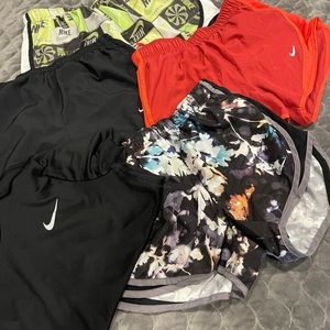 Nike running shorts (4 total) & workout shirt